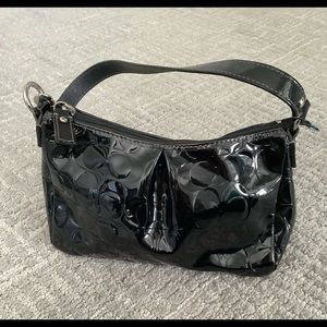 Coach black patent leather. Perfect size for Saturday night or formal wear